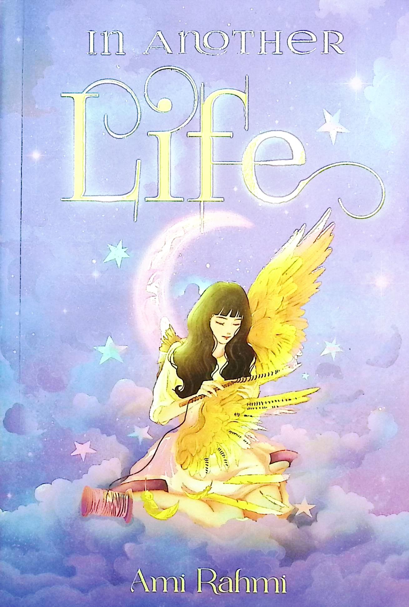 Cover In another life / Ami Rahmi; penyunting, Handi Namire